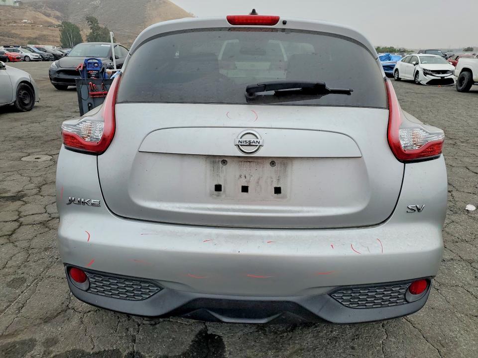 2016 Nissan Juke VIN JN8AF5MR2GT603165 COPART salvage auction — SIDE, Salvage Title, sold $1,200 on 2026-08-25 (photo 6)