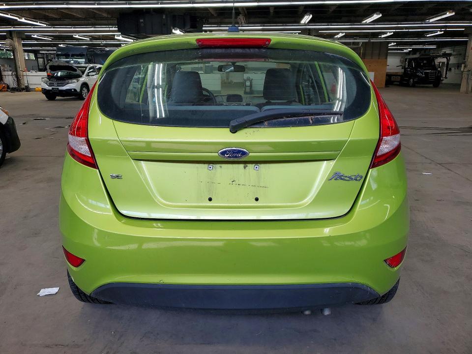 2012 Ford Fiesta VIN 3FADP4EJ9CM101860 COPART salvage auction — MINOR DENT/SCRATCHES, Il - Certificate Of Title, sold $325 on 2026-07-09 (photo 6)