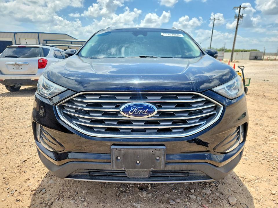 2019 Ford VIN 2FMPK3K91KBC61818 COPART salvage auction — MINOR DENT/SCRATCHES, Tx - Certificate Of Title, sold $2,950 on 2026-07-09 (photo 5)