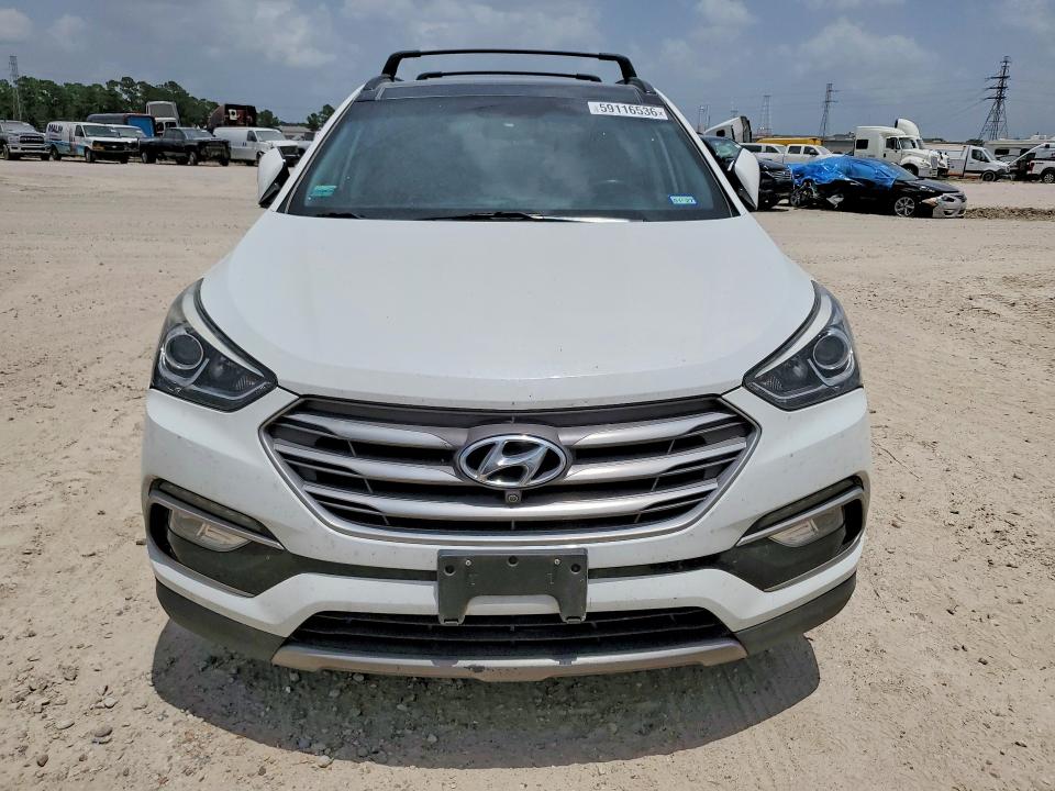 2017 Hyundai Santa fe VIN 5XYZU3LB3HG415250 COPART salvage auction — NORMAL WEAR, Tx - Certificate Of Title, sold $3,400 on 2026-07-02 (photo 5)