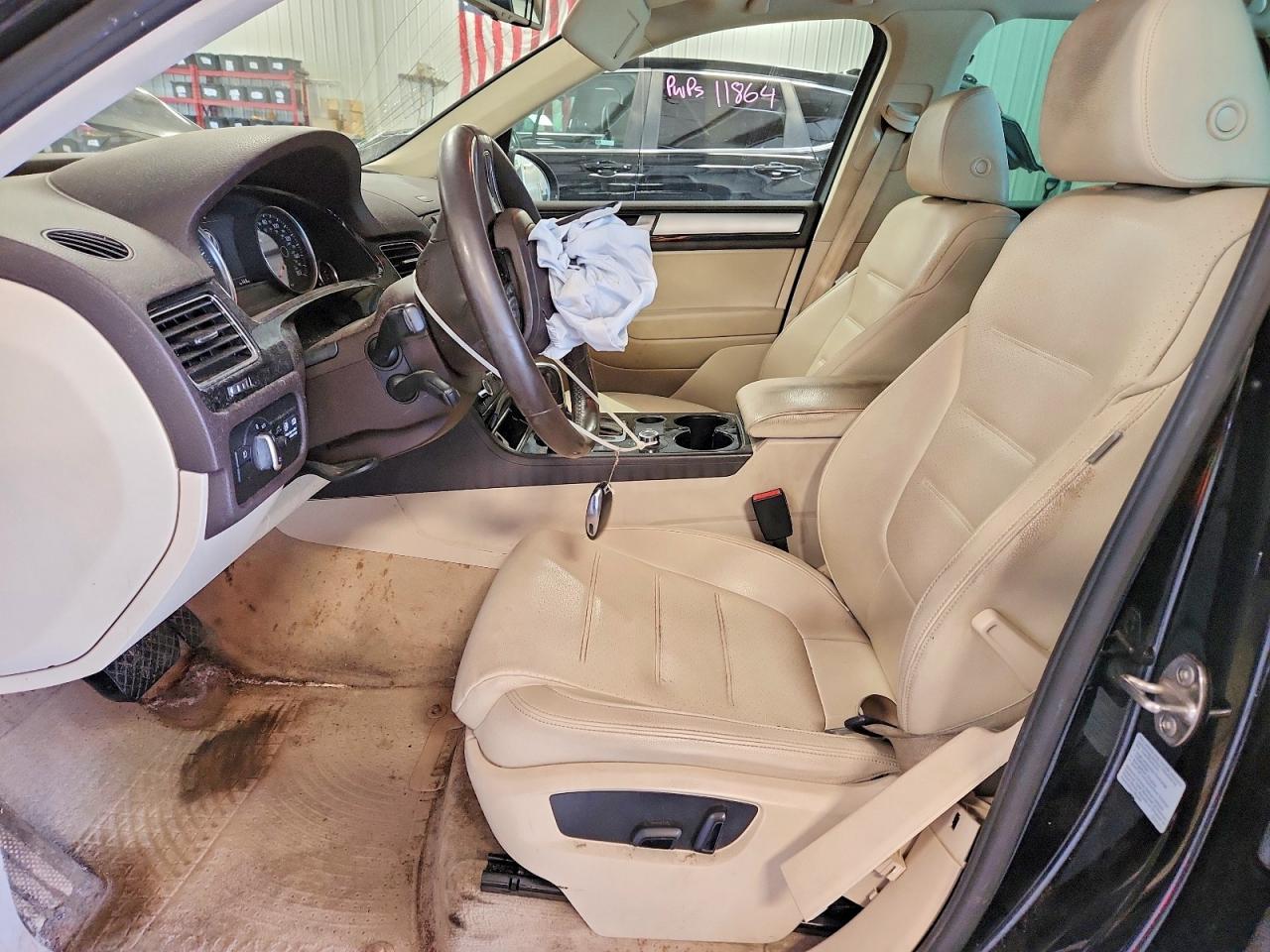2012 Volkswagen Touareg VIN WVGEK9BPXCD010395 COPART salvage auction — Front End, MN - CERT OF TITLE-PRIOR SALVAGE, sold $900 on 2026-07-02 (photo 7)