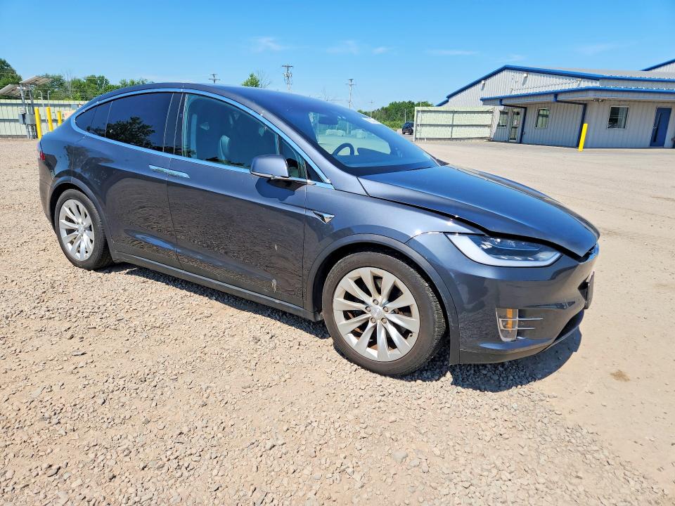 2018 Tesla Model x VIN 5YJXCDE23JF122300 COPART salvage auction — MINOR DENT/SCRATCHES, NY - CERT OF TITLE-REBUILT SALVAGE, sold $8,400 on 2026-07-08 (photo 4)