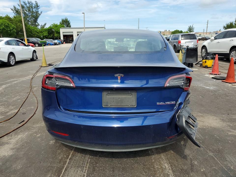 2019 Tesla Model 3 VIN 5YJ3E1EB8KF237774 COPART salvage auction — REAR END, Fl - Cert Of Title Slvg Rebuildable, sold $5,500 on 2026-07-08 (photo 6)