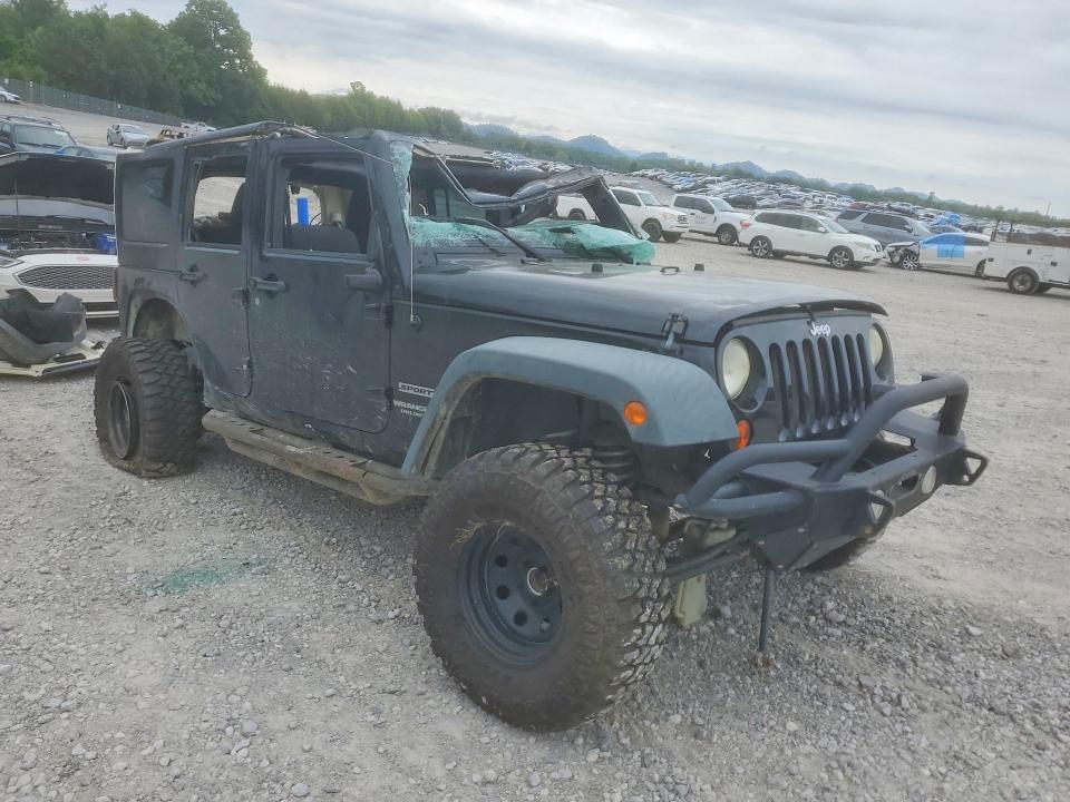 2011 Jeep Wrangler / VIN 1J4BA3H17BL610574 COPART salvage auction — ROLLOVER, Tn - Salvage Certificate, sold $1,000 on 2026-07-09 (photo 4)