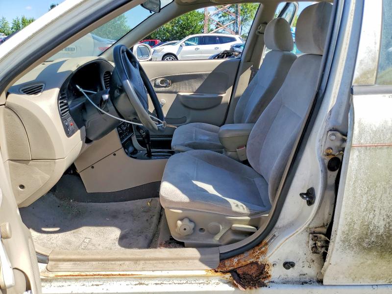 2001 Kia Sephia VIN KNAFB121615011750 COPART salvage auction — MECHANICAL, In - Certificate Of Title, sold $325 on 2026-07-13 (photo 7)