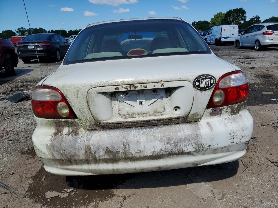 2001 Kia Sephia VIN KNAFB121615011750 COPART salvage auction — MECHANICAL, In - Certificate Of Title, sold $325 on 2026-07-13 (photo 6)