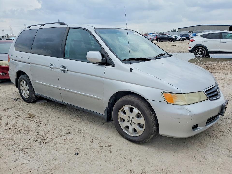 2002 Honda Odyssey VIN 2HKRL18032H514861 COPART salvage auction — NORMAL WEAR, TX - CERTIFICATE OF TITLE, sold $1,050 on 2026-07-02 (photo 4)