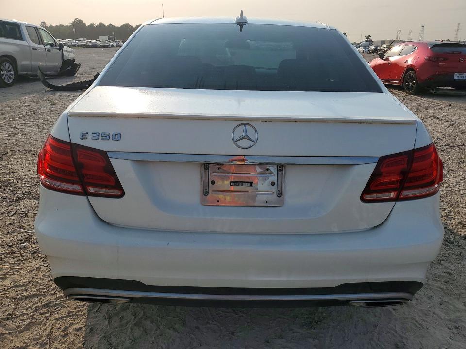 2014 Mercedes-benz E-klasse VIN WDDHF5KB0EA980804 COPART salvage auction — SIDE, TX - SALVAGE VEHICLE TITLE (P), sold $3,150 on 2026-07-17 (photo 6)