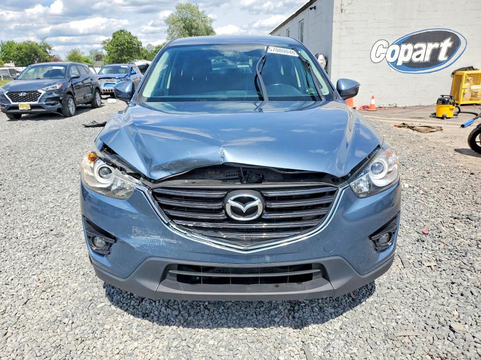 2016 Mazda VIN JM3KE4CY8G0698989 COPART salvage auction — FRONT END, Pa - Certificate Of Salvage, sold $3,450 on 2026-07-24 (photo 5)