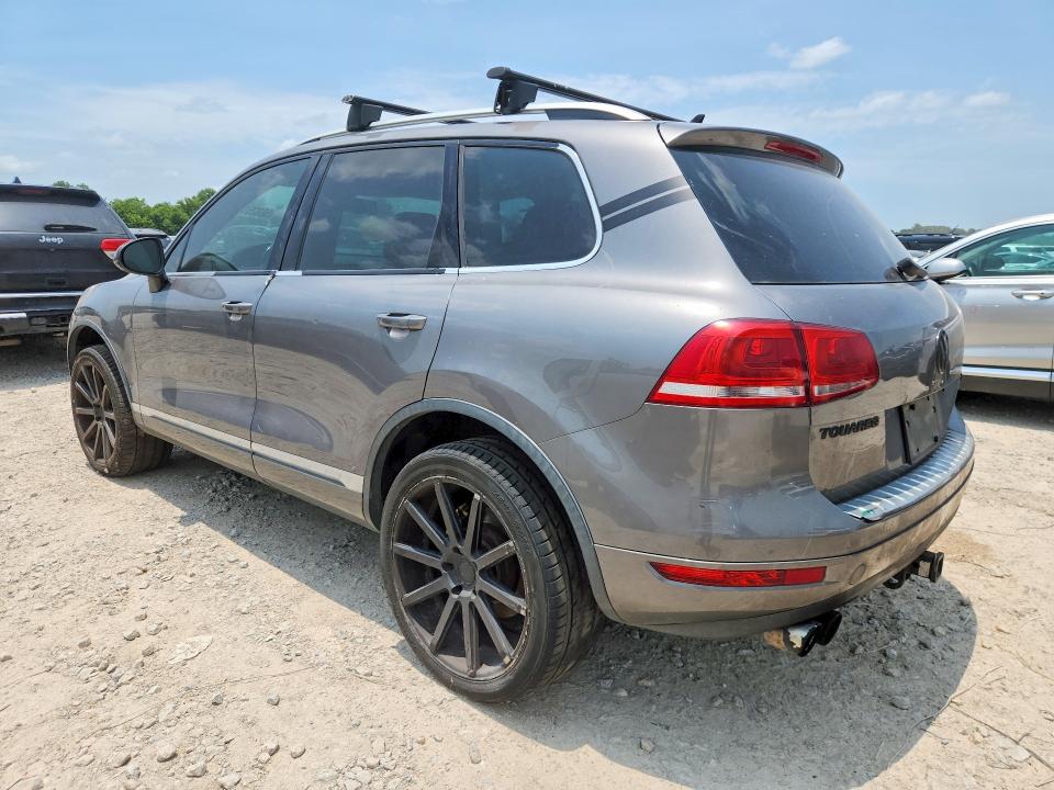 2011 Volkswagen Touareg VIN WVGFF9BP3BD001237 COPART salvage auction — MINOR DENT/SCRATCHES, Tx - Certificate Of Title, sold $750 on 2026-07-21 (photo 2)