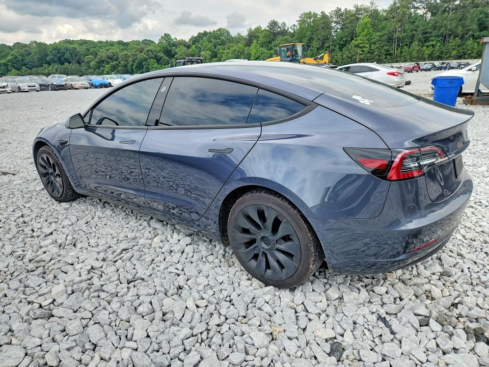 2023 Tesla Model 3 VIN 5YJ3E1EA2PF400272 COPART salvage auction — SIDE, Ga - Cert Of Title-Salvage, sold $11,500 on 2026-07-14 (photo 2)