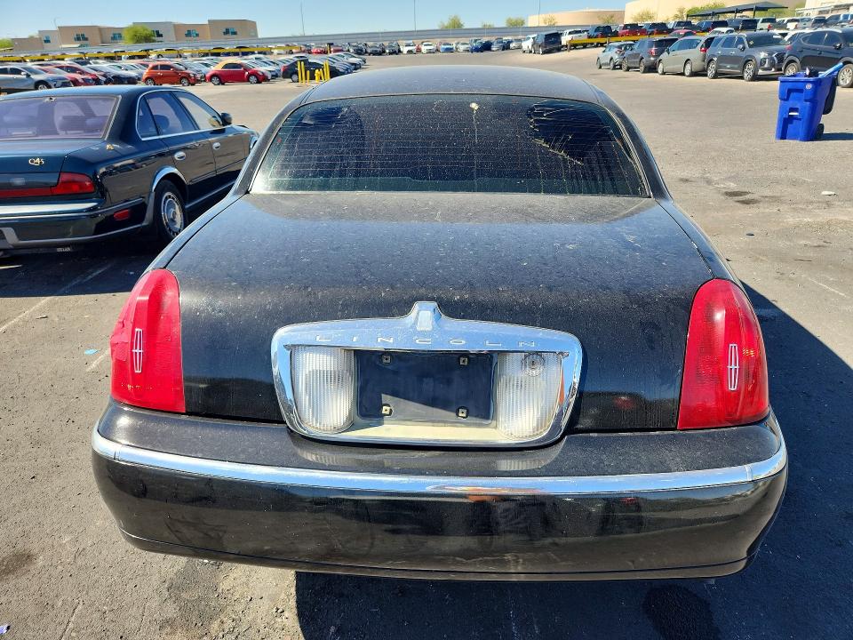 1998 Lincoln TOWN CAR VIN 1LNFM82W9WY669730 COPART salvage auction — ENGINE BURN, Nv - Non-Repairable Vehicle Cert, sold $125 on 2026-07-08 (photo 6)