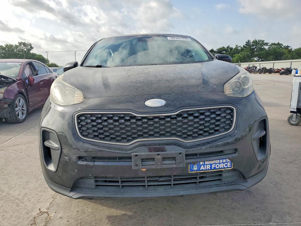 2017 Kia Sportage VIN KNDPM3AC4H7161306 COPART salvage auction — SIDE, TX - SALVAGE VEHICLE TITLE (P), sold $2,250 on 2026-07-16 (photo 5)