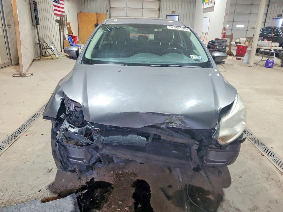 2012 Ford Focus VIN 1FAHP3M22CL210636 COPART salvage auction — FRONT END, PA - CERT OF TITLE, sold $400 on 2026-07-02 (photo 5)