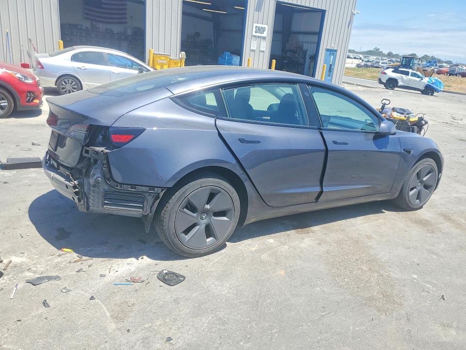 2023 Tesla Model 3 VIN 5YJ3E1EA5PF674663 COPART salvage auction — REAR END, Ca - Salvage Certificate, sold $10,700 on 2026-07-02 (photo 3)