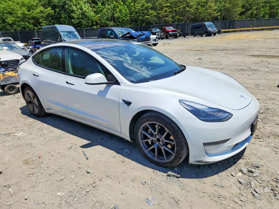 2022 Tesla Model 3 VIN 5YJ3E1EA0NF369441 COPART salvage auction — SIDE, Va - Certificate Of Title, sold $9,000 on 2026-07-08 (photo 4)