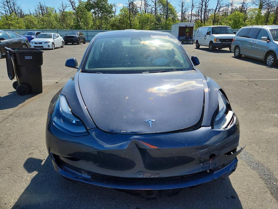 2023 Tesla VIN 5YJ3E1EA9PF679168 COPART salvage auction — FRONT END, Ny - Mv-907A Salvage Certificate, sold $6,200 on 2026-07-22 (photo 5)