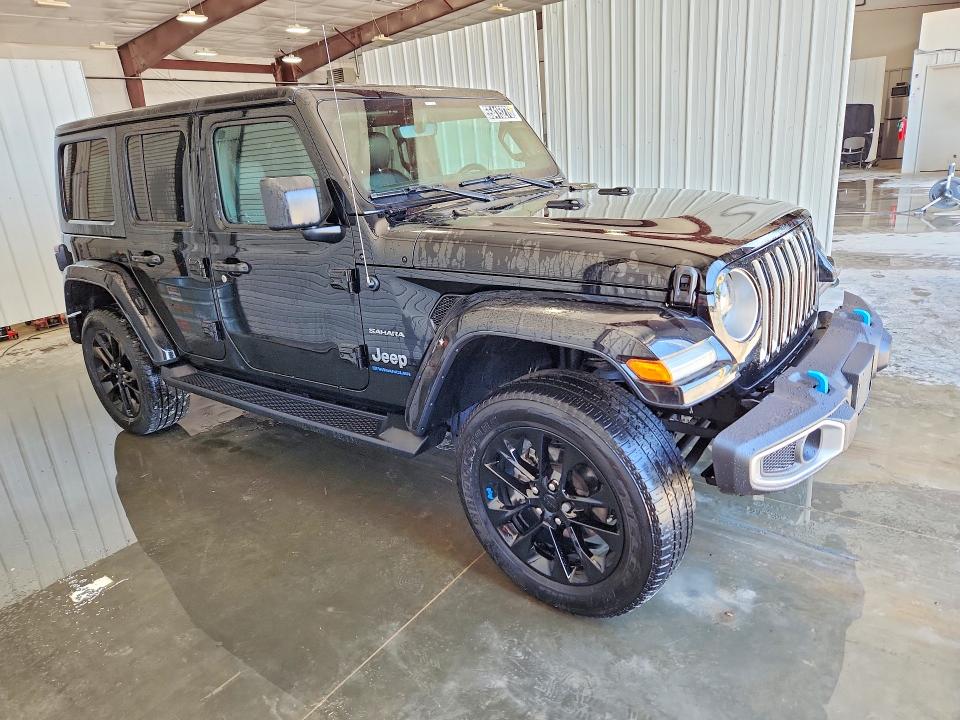2023 Jeep Wrangler / VIN 1C4JJXP64PW556775 COPART salvage auction — MINOR DENT/SCRATCHES, Mo - Certificate Of Title, sold $22,250 on 2026-07-02 (photo 4)