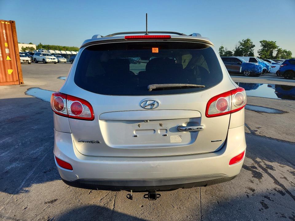 2012 Hyundai Santa fe VIN 5XYZK3ABXCG128084 COPART salvage auction — SIDE, Fl - Cert Of Title Slvg Rebuildable, sold $1,150 on 2026-07-16 (photo 6)