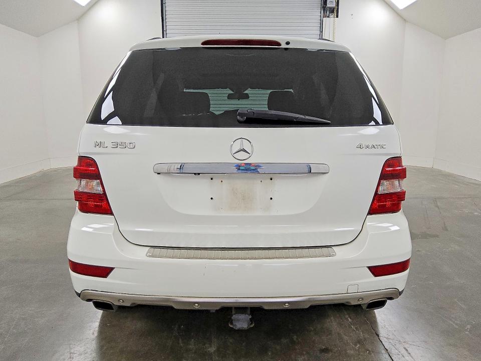 2009 Mercedes-benz Ml-class VIN 4JGBB86E99A515148 COPART salvage auction — MINOR DENT/SCRATCHES, TX - CERTIFICATE OF TITLE, sold $1,800 on 2026-07-09 (photo 6)