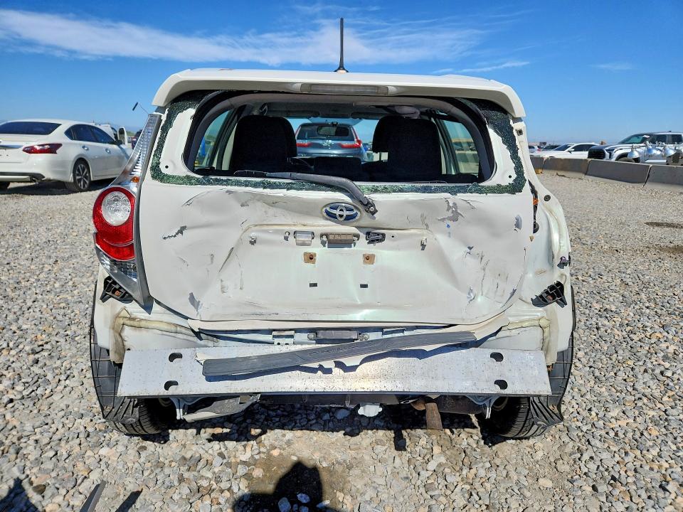 2012 Toyota Prius c VIN JTDKDTB32C1518972 COPART salvage auction — REAR END, CO - SALVAGE TITLE, sold $875 on 2026-07-28 (photo 6)