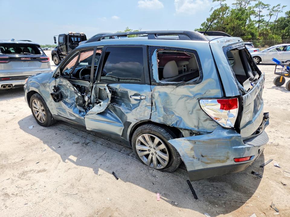 2011 Subaru Forester VIN JF2SHAEC7BH728253 COPART salvage auction — SIDE, Fl - Cert Of Title Slvg Rebuildable, sold $250 on 2026-07-15 (photo 2)