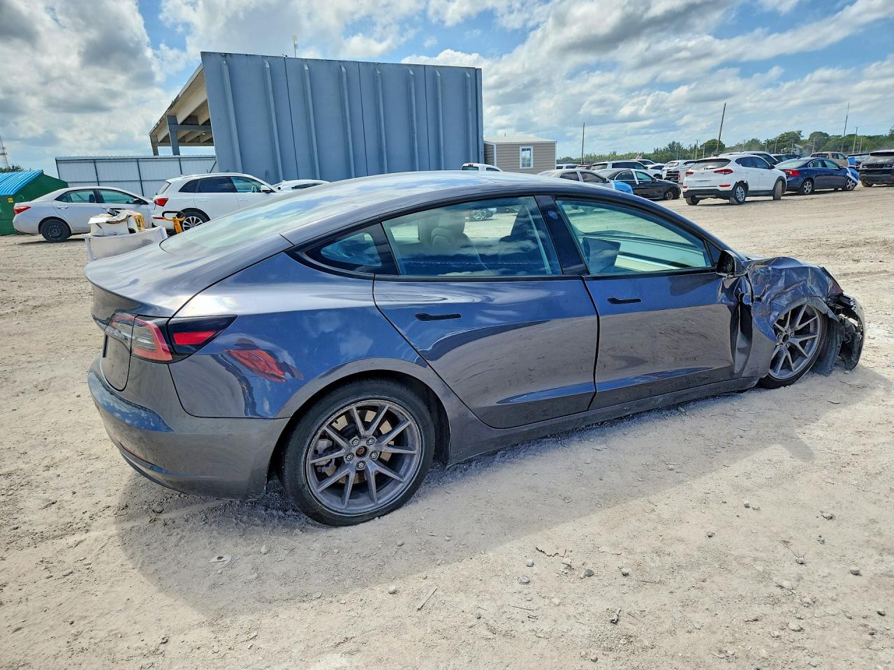 2023 Tesla Model 3 VIN 5YJ3E1EA7PF697474 COPART salvage auction — Side, MD - CERTIFICATE OF TITLE, sold $5,900 on 2026-07-03 (photo 3)