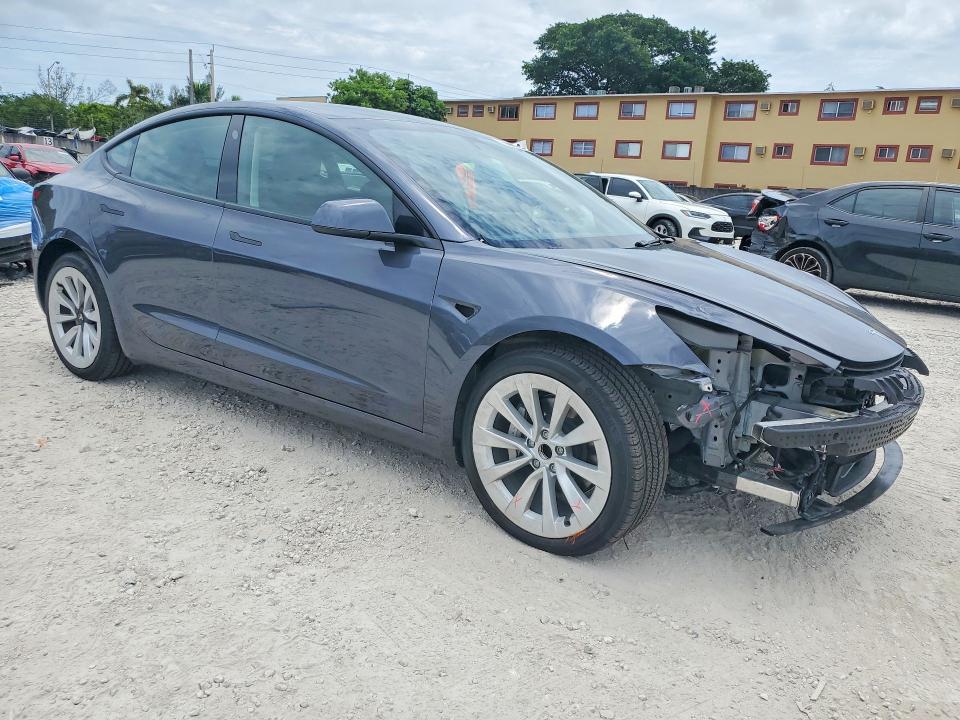 2023 Tesla Model 3 VIN 5YJ3E1EA6PF671061 COPART salvage auction — FRONT END, Fl - Cert Of Title Slvg Rebuildable, sold $10,200 on 2026-07-07 (photo 4)