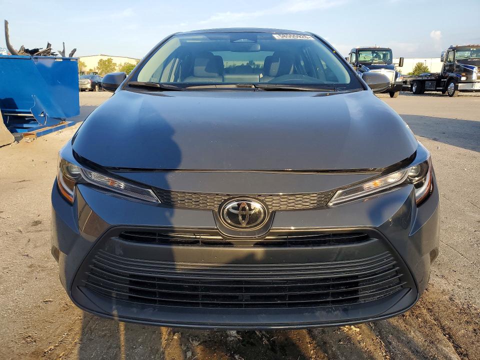 2025 Toyota Corolla VIN 5YFB4MDE0SP334757 COPART salvage auction — WATER/FLOOD, Fl - Certificate Of Destruction, sold $4,050 on 2026-07-28 (photo 5)