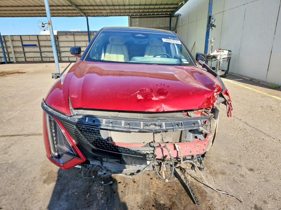 2024 Cadillac Lyriq VIN 1GYKPWRL4RZ135022 COPART salvage auction — ALL OVER, Tx - Salvage Vehicle Title, sold $13,300 on 2026-08-21 (photo 5)