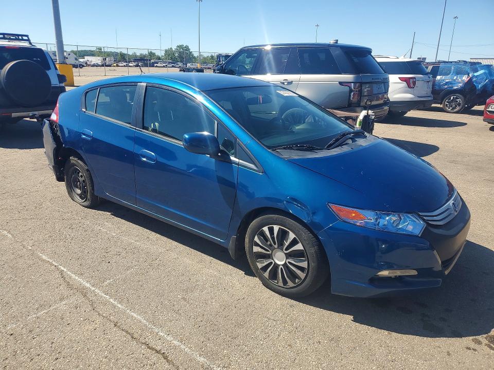 2012 Honda Insight VIN JHMZE2H59CS001417 COPART salvage auction — SIDE, Salvage Title, sold $750 on 2026-07-10 (photo 4)
