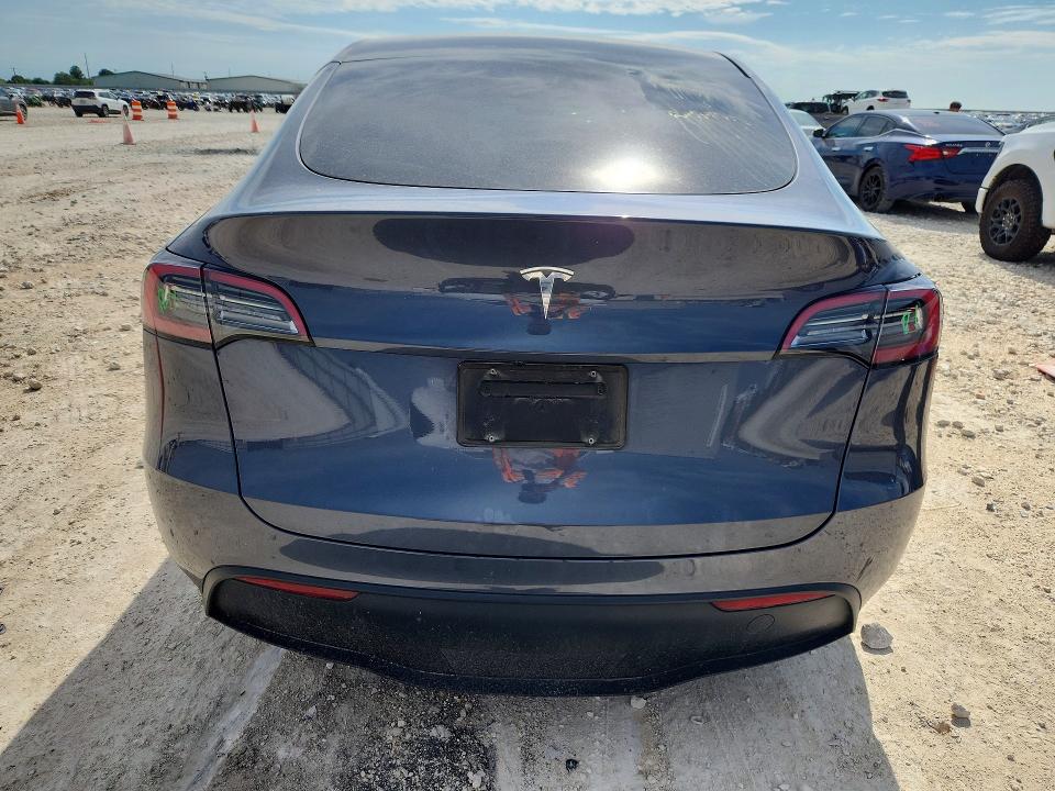 2023 Tesla VIN 7SAYGDED5PF958132 COPART salvage auction — SIDE, Tx - Salvage Vehicle Title, sold $2,000 on 2026-07-30 (photo 6)