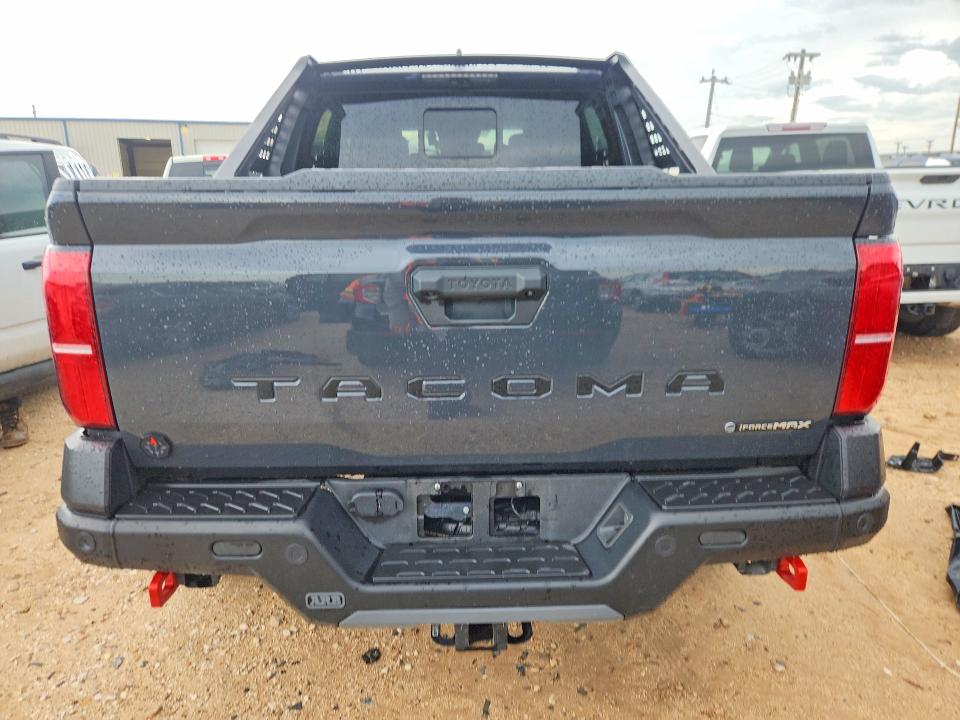 2025 Toyota Tacoma VIN 3TYLC5LN6ST043657 COPART salvage auction — SIDE, Tx - Salvage Vehicle Title, sold $50,000 on 2026-07-30 (photo 6)