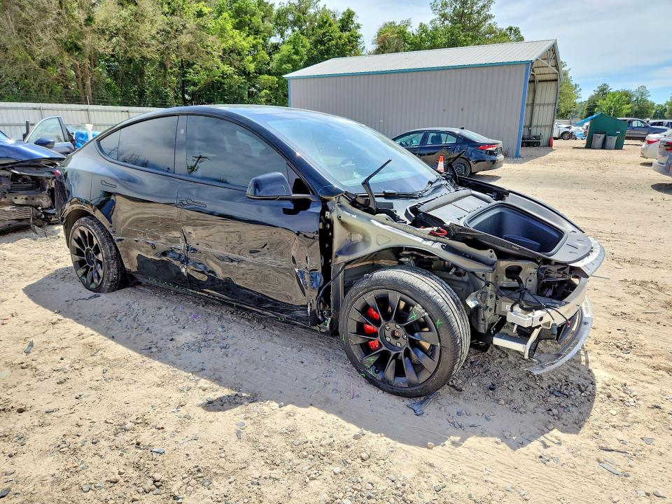 2024 Tesla Model y VIN 7SAYGDEE1RA215900 COPART salvage auction — FRONT END, Fl - Cert Of Title Slvg Rebuildable, sold $11,400 on 2026-07-17 (photo 4)