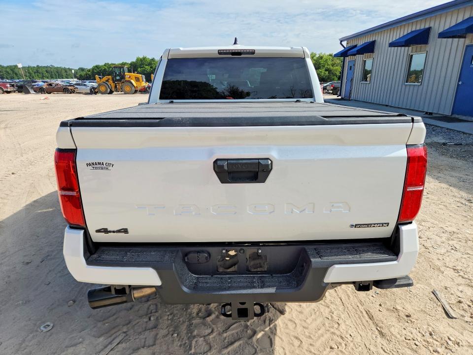 2026 Toyota Tacoma VIN 3TYLC5LN7TT057763 COPART salvage auction — SIDE, Fl - Cert Of Title Slvg Rebuildable, sold $16,700 on 2026-07-31 (photo 6)