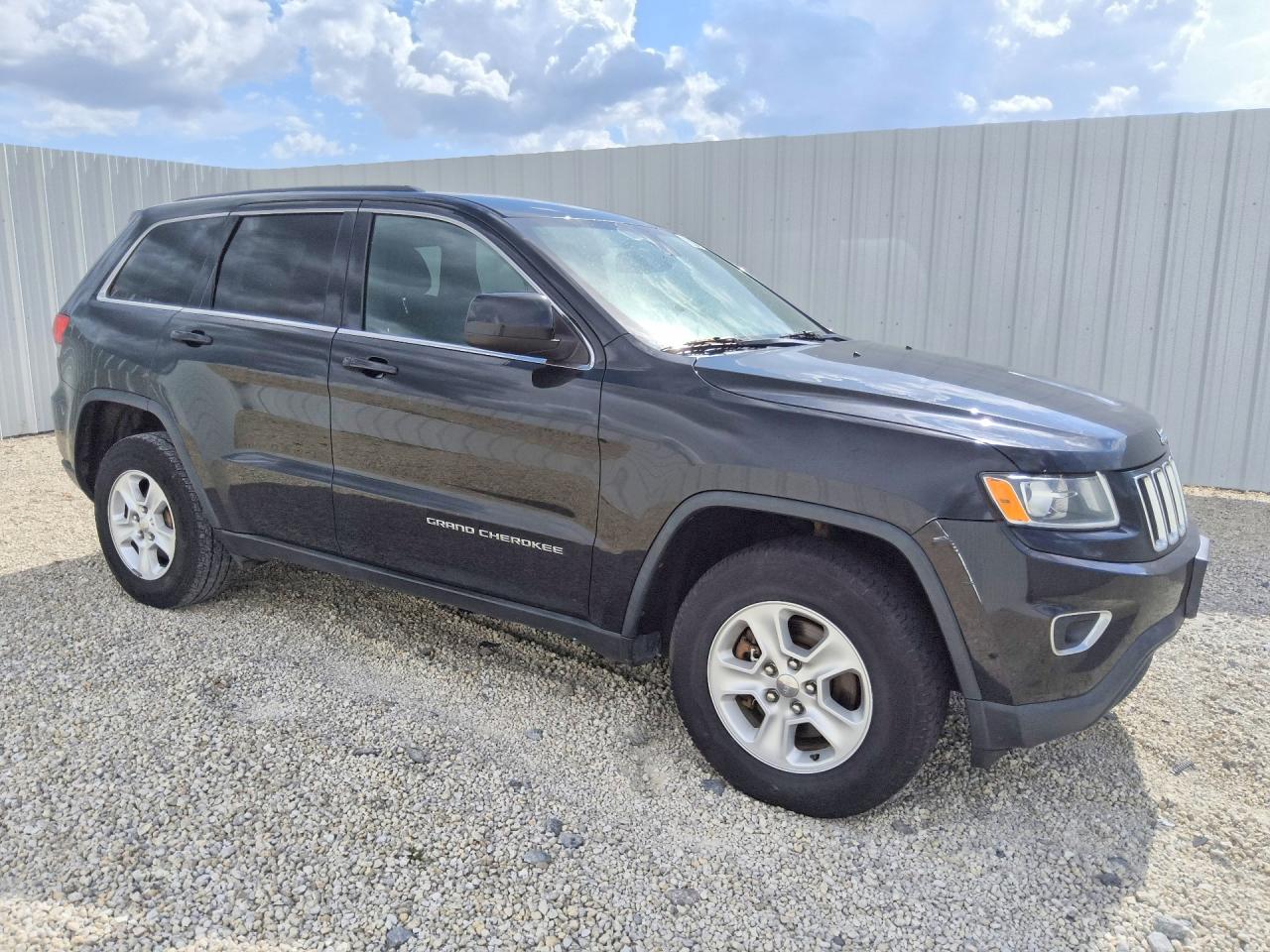 2015 Jeep Grand Cherokee VIN 1C4RJFAG4FC833391 COPART salvage auction — Normal Wear, FL - CERTIFICATE OF TITLE, sold $400 on 2026-07-09 (photo 4)