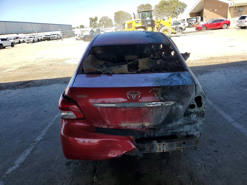 2010 Toyota Yaris VIN JTDBT4K38A4068264 COPART salvage auction — BURN, CA - NON-REPAIRABLE VEHICLE CERT, sold $100 on 2026-07-09 (photo 6)