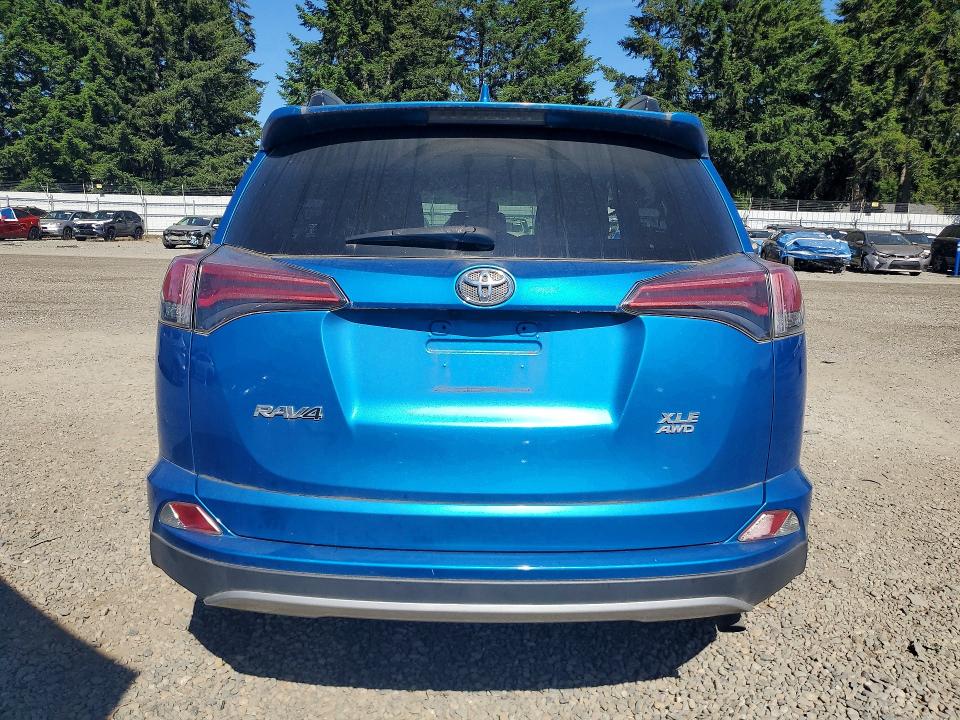 2018 Toyota Rav 4 VIN JTMRFREV1JJ192183 COPART salvage auction — SIDE, Salvage Title, sold $450 on 2026-07-21 (photo 6)