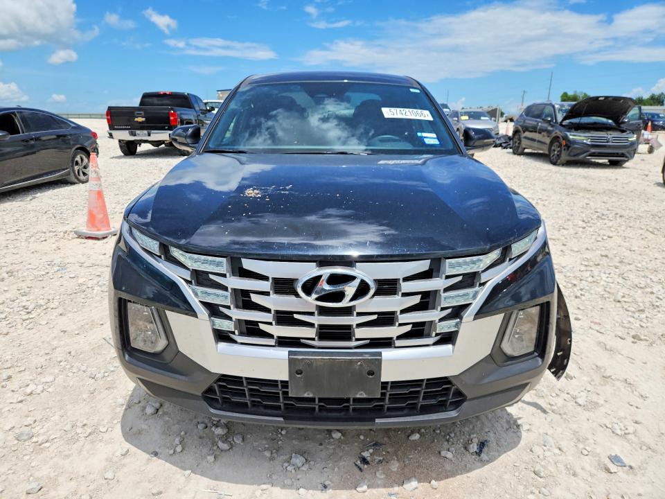 2024 Hyundai Santa cruz VIN 5NTJB4DE3RH112532 COPART salvage auction — SIDE, Tx - Salvage Vehicle Title, sold $6,500 on 2026-07-16 (photo 5)