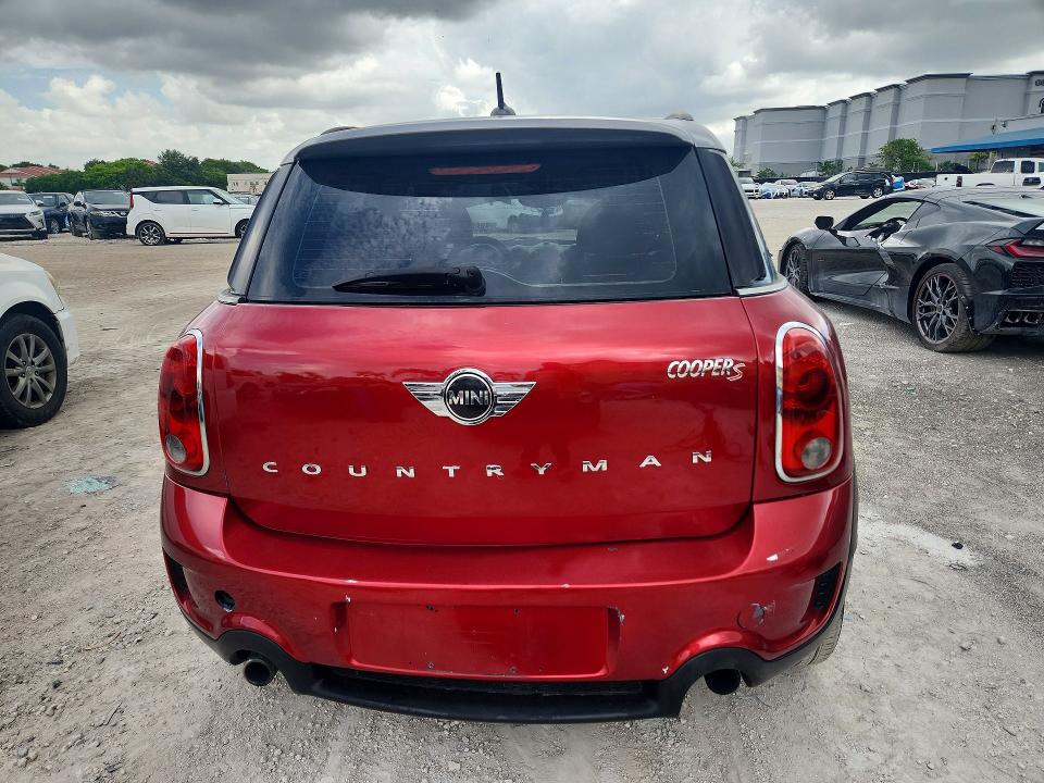 2011 Mini Cooper VIN WMWZC3C5XBWM25827 COPART salvage auction — MINOR DENT/SCRATCHES, Fl - Cert Of Title-Rebuilt, sold $975 on 2026-07-02 (photo 6)