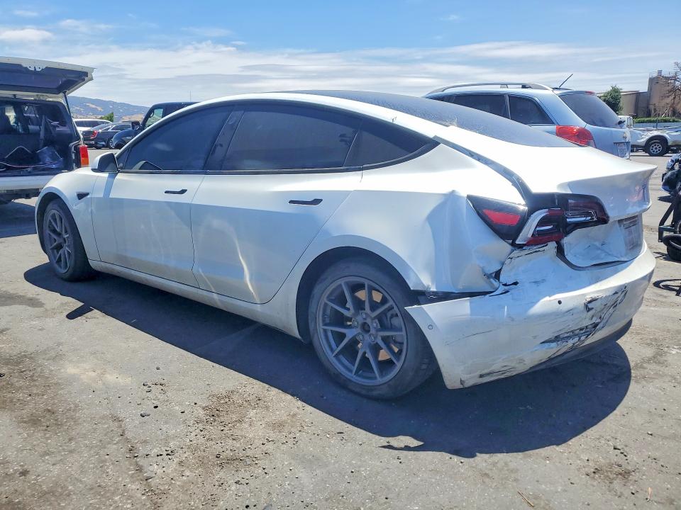 2021 Tesla Model 3 VIN 5YJ3E1EB7MF928474 COPART salvage auction — REAR END, Ca - Salvage Certificate, sold $60 on 2026-07-28 (photo 2)