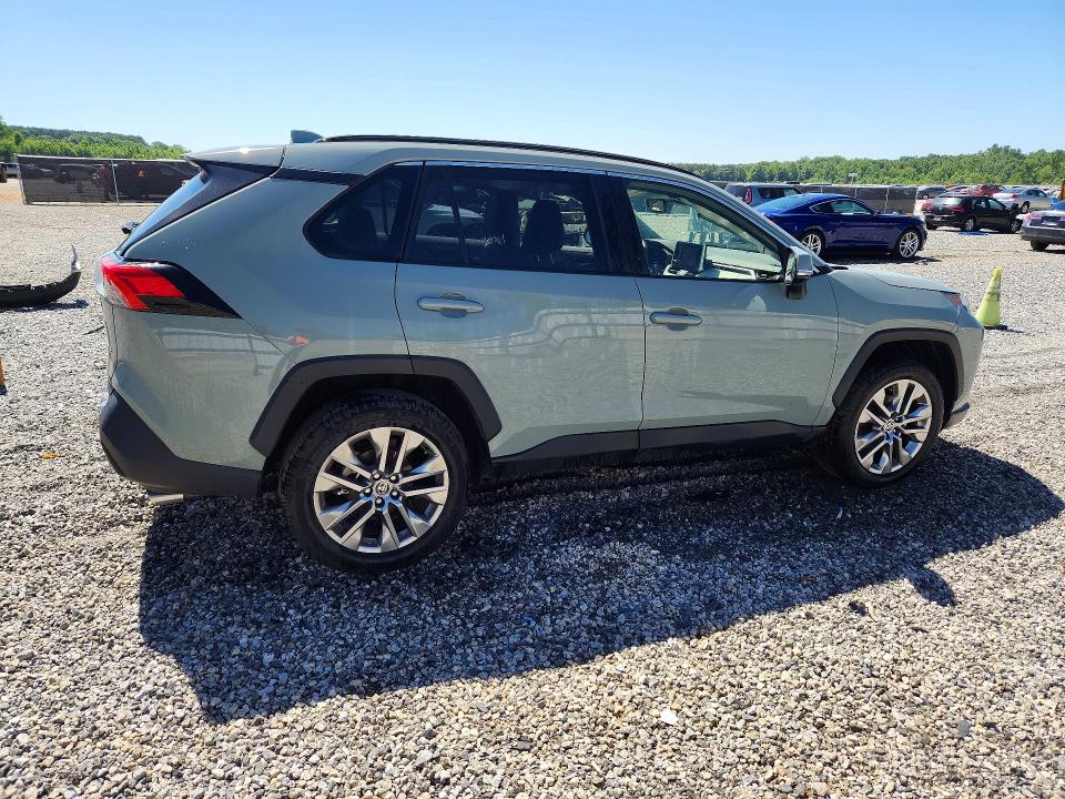 2023 Toyota Rav 4 VIN JTMC1RFV9PD100697 COPART salvage auction — SIDE, Nc - Salvage Certificate Of Title, sold $375 on 2026-07-22 (photo 3)