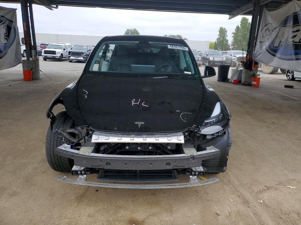2024 Tesla Model y VIN 7SAYGDEFXRF022544 COPART salvage auction — SIDE, Ca - Salvage Certificate, sold $6,300 on 2026-07-23 (photo 5)