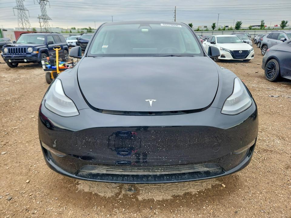 2023 Tesla Model y VIN 7SAYGDEF7PF708666 COPART salvage auction — REAR END, Il - Salvage Certificate, sold $6,000 on 2026-07-28 (photo 5)