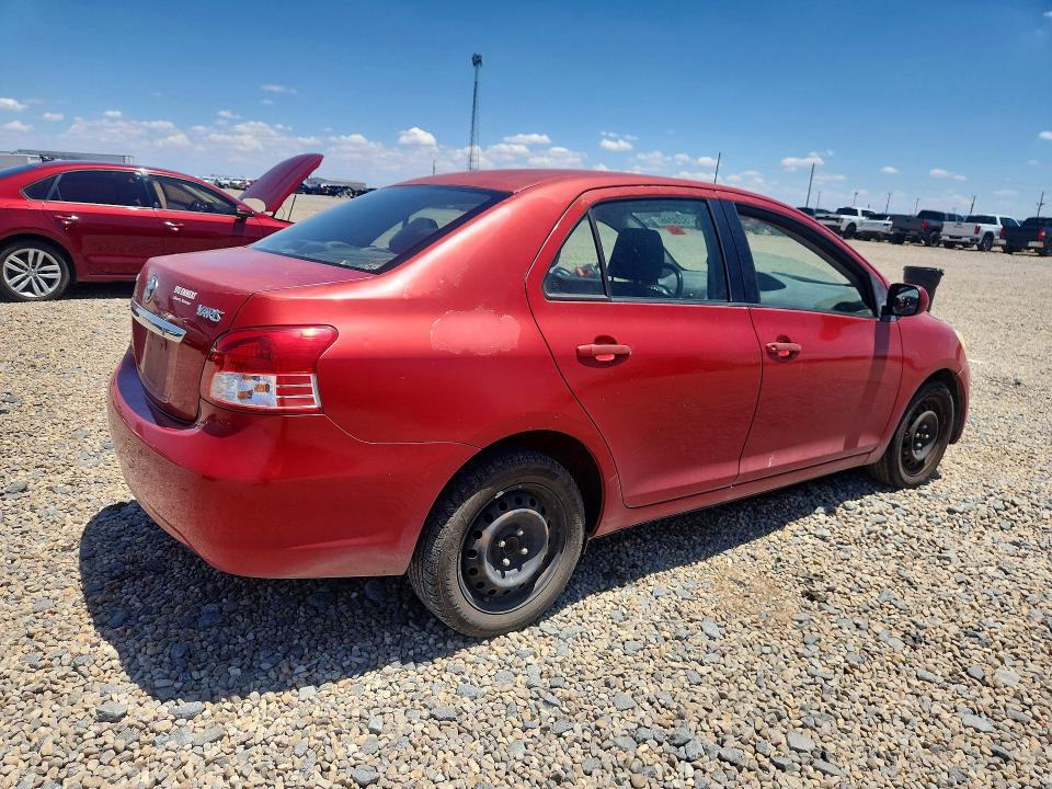 2011 Toyota Yaris VIN JTDBT4K30B1404802 COPART salvage auction — SIDE, Ks - Cert Of Title-Salvage, sold $750 on 2026-07-28 (photo 3)