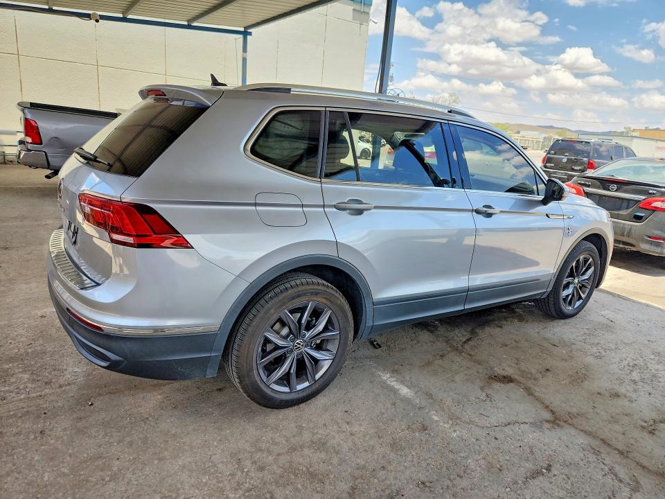 2023 Volkswagen Tiguan VIN 3VV3B7AX0PM084289 COPART salvage auction — SIDE, Tx - Salvage Vehicle Title, sold $9,500 on 2026-08-21 (photo 3)