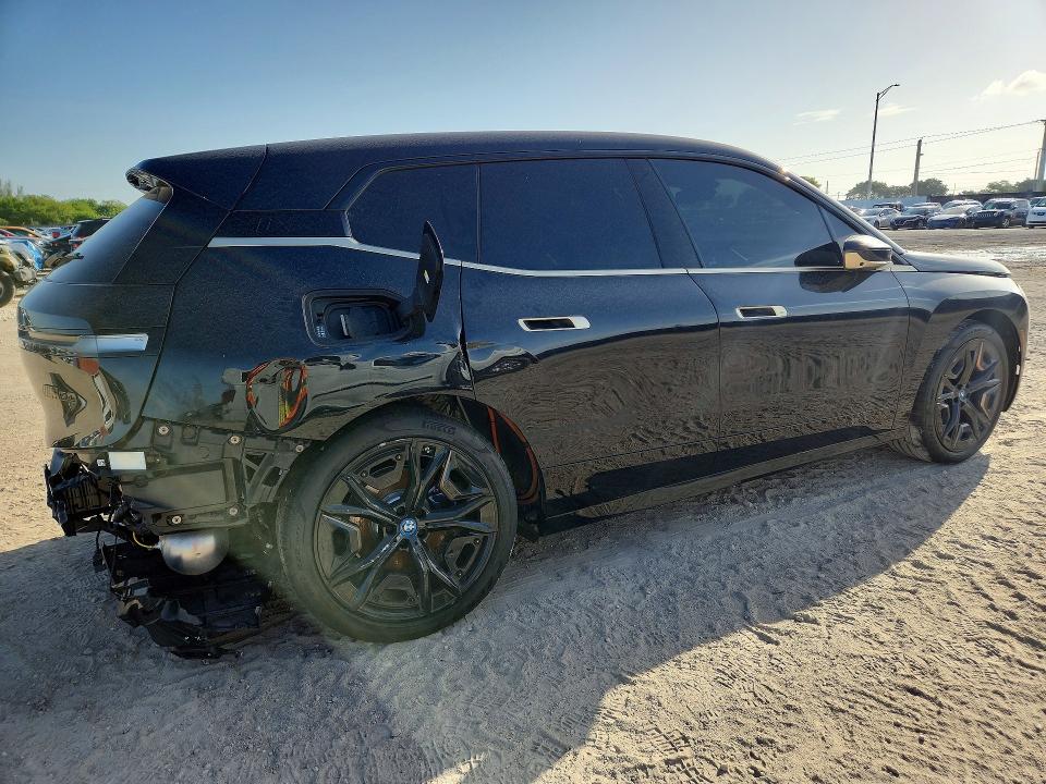 2023 BMW Ix VIN WB533CF0XPCM75950 COPART salvage auction — REAR END, Fl - Cert Of Title Slvg Rebuildable, sold $35,750 on 2026-08-19 (photo 3)