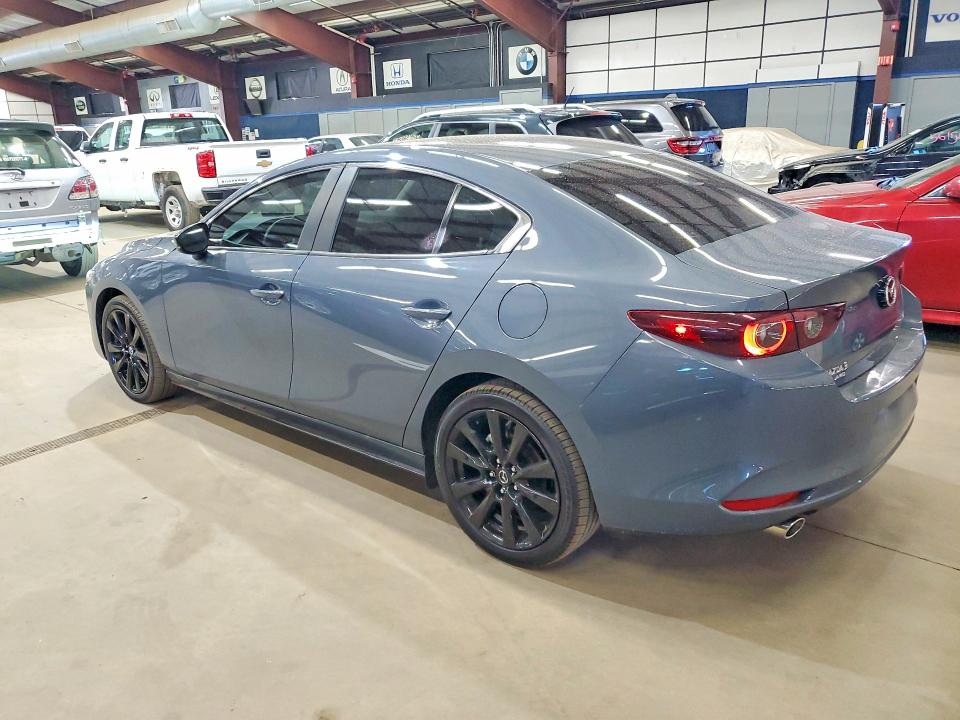 2025 Mazda VIN JM1BPBCM8S1775206 COPART salvage auction — SIDE, Tx - Certificate Of Title (P), sold $12,700 on 2026-07-23 (photo 2)