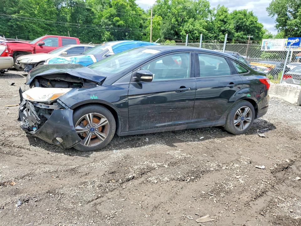 2014 Ford Focus VIN 1FADP3F24EL410643 — COPART salvage auction photo