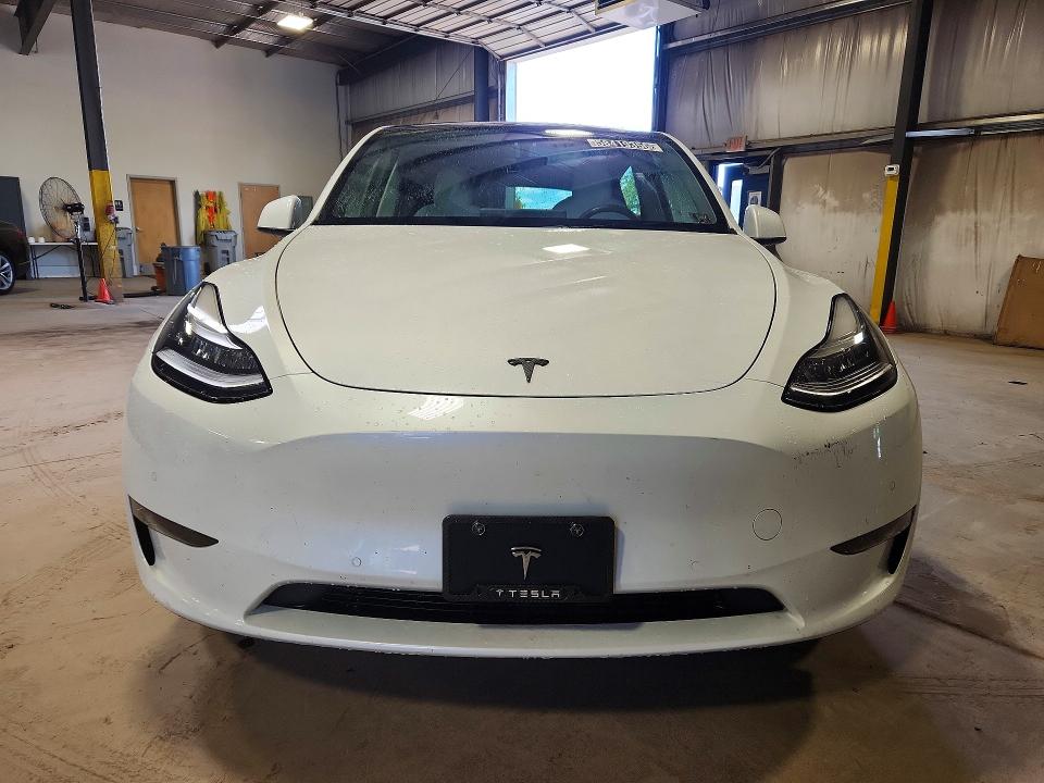 2021 Tesla Model y VIN 5YJYGDED2MF109150 COPART salvage auction — NORMAL WEAR, Wv - Certificate Of Title, sold $18,000 on 2026-07-23 (photo 5)